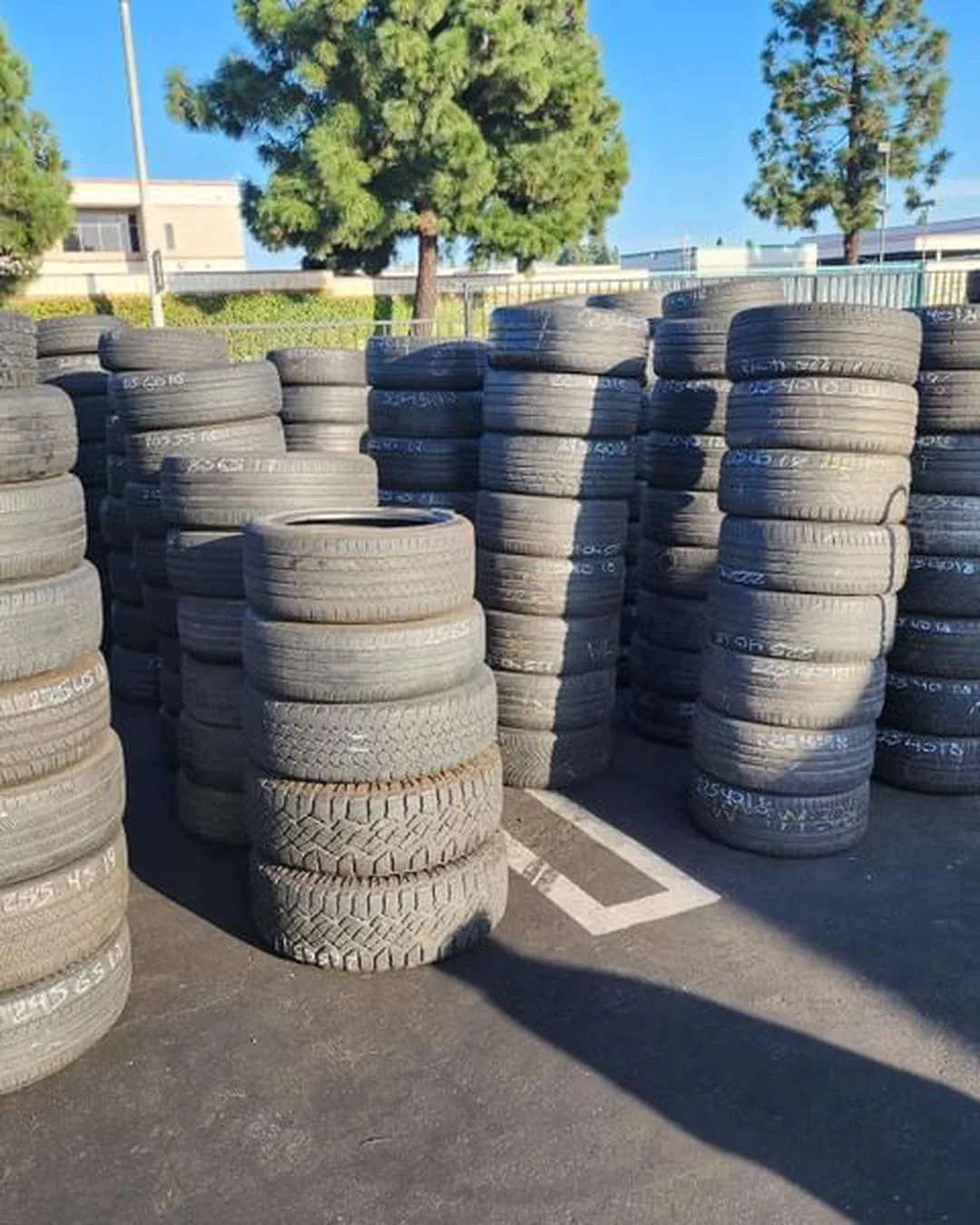 Rows of marked used tires at Direct Tire Zone